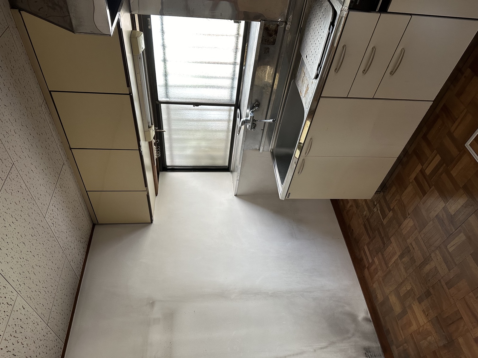 Original dated kitchen in abandoned akiya before restoration