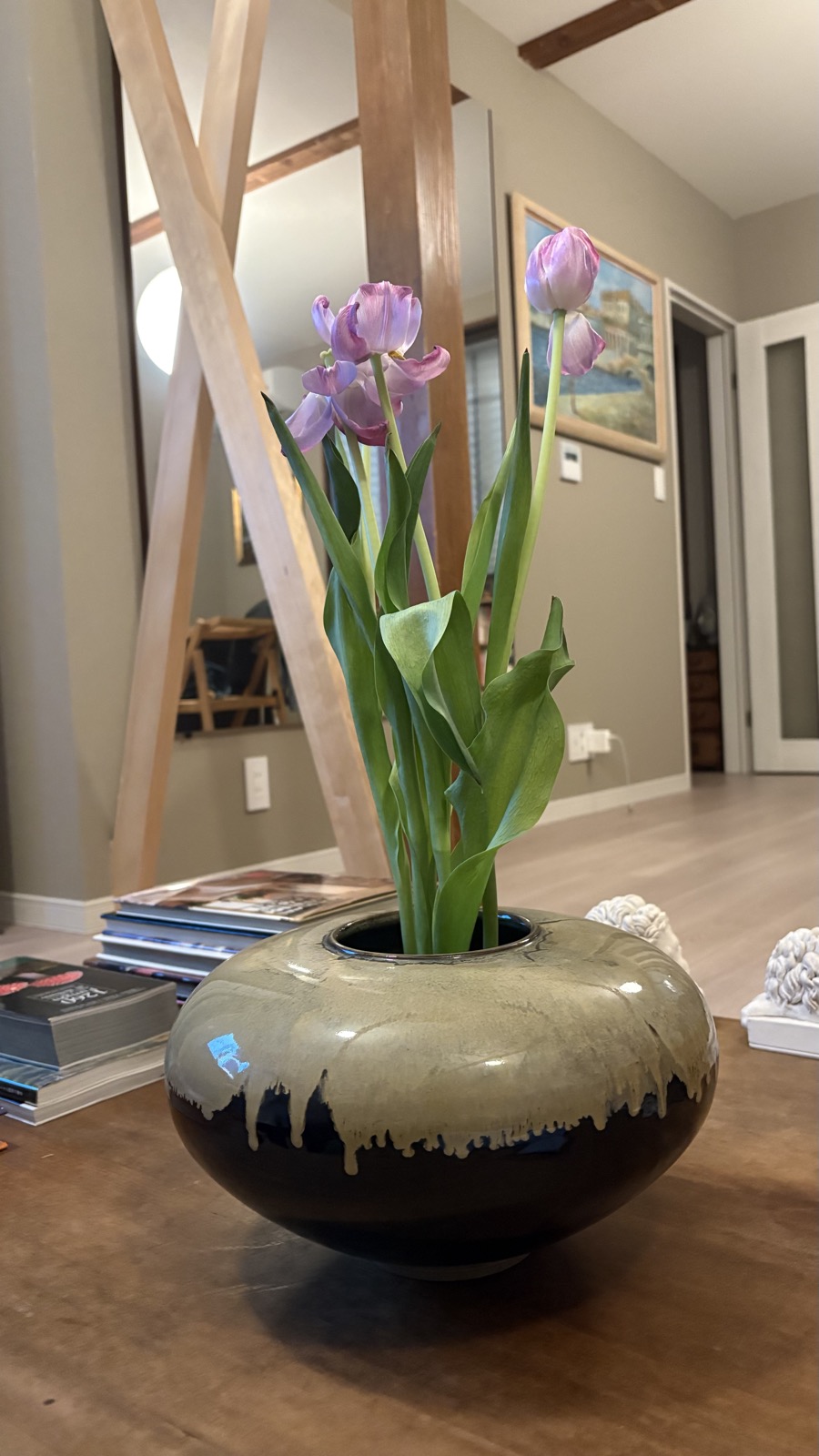 The finished result — spring tulips in our auction vase, on the living room table of our restored akiya